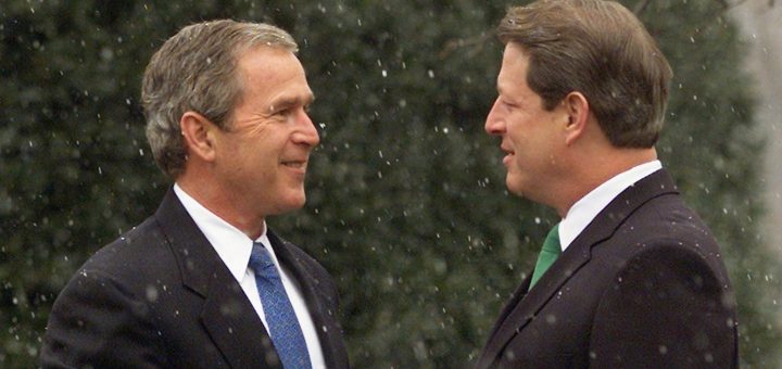 Vice President Al Gore (R) shakes hands with President-elect George W. Bush after Bush arrived for a meeting December 19, 2000.